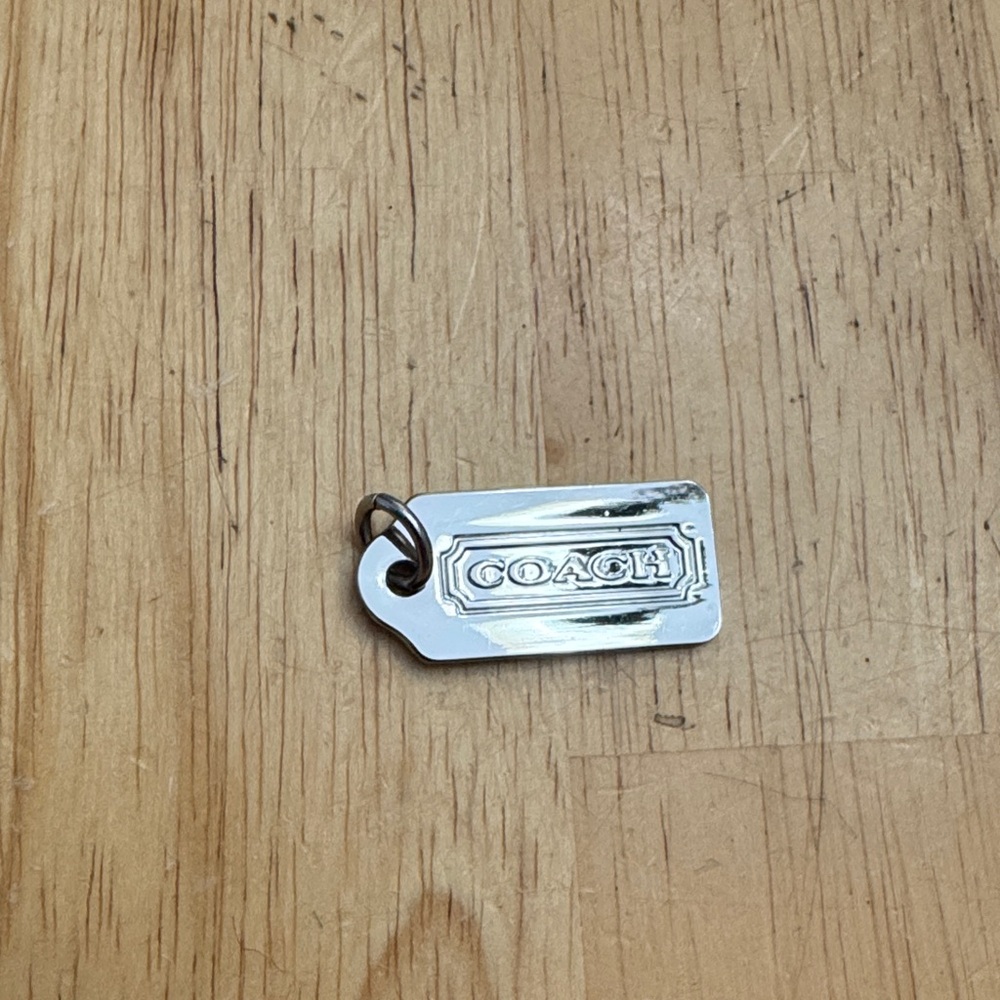 Coach Metallic Silver bag charm